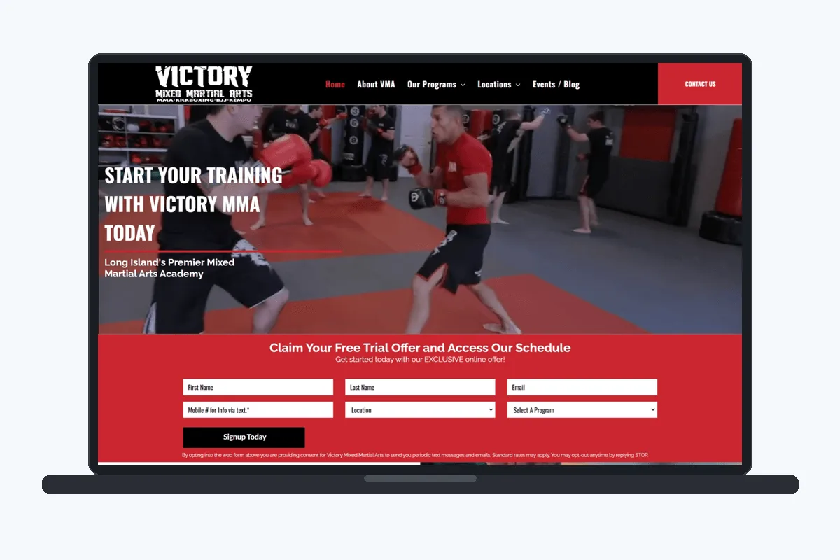 Victory MMA website design displayed on a laptop screen